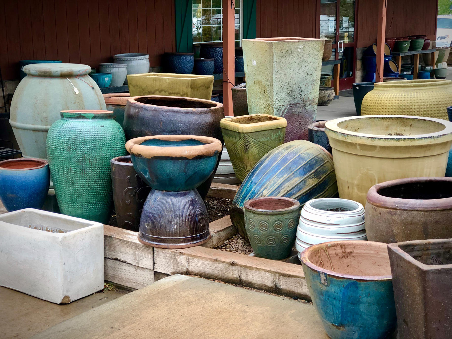 A collection of pottery at Botanicals Kaysville retail location