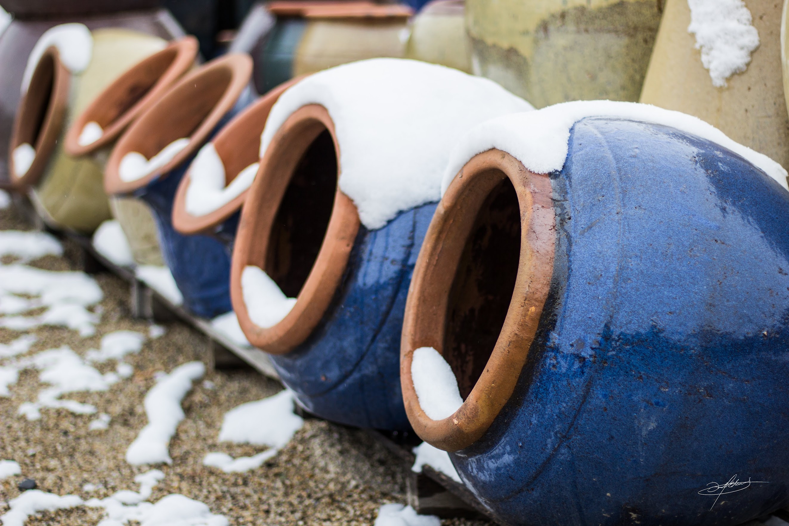 small ceramic pottery with snow on top at botanicals sandy